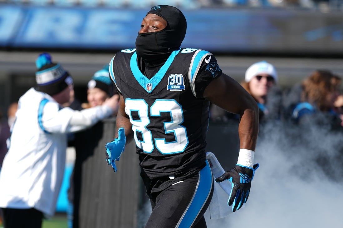 Dec 22, 2024; Charlotte, North Carolina, USA; Carolina Panthers wide receiver David Moore (83) takes the field during the first quarter against the Arizona Cardinals at Bank of America Stadium. Mandatory Credit: Jim Dedmon-Imagn Images