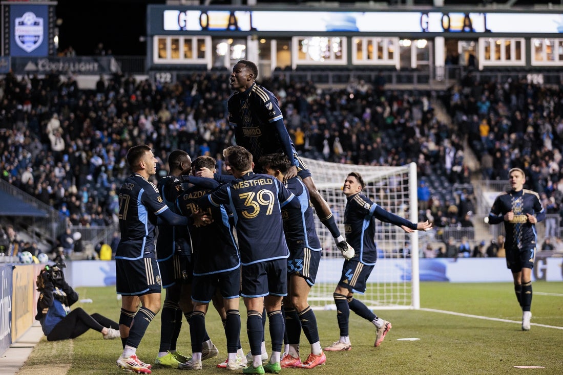 Mar 1, 2025; Chester, Pennsylvania, USA; Philadelphia Union forward Tai Baribo (9) celebrates with teammates after scoring a hat-trick goal against FC Cincinnati during the second half at Subaru Park. Mandatory Credit: Caean Couto-Imagn Images