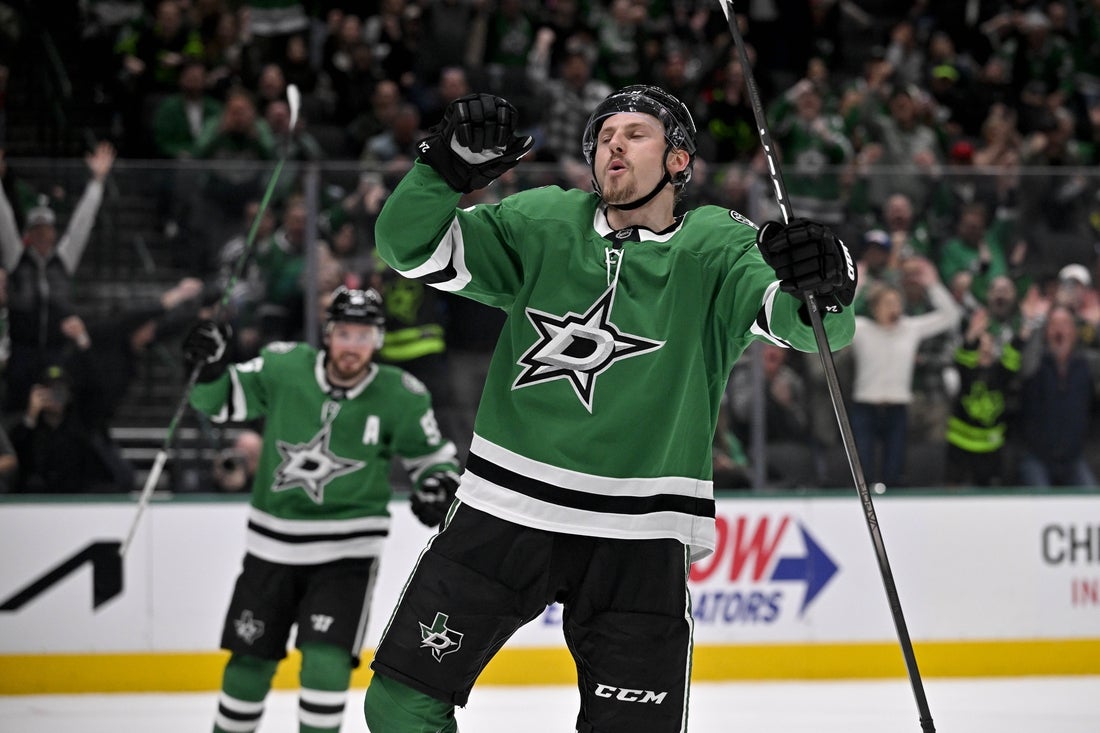 Mar 4, 2025; Dallas, Texas, USA; Dallas Stars center Roope Hintz (24) celebrates after he scores a power play goal against the New Jersey Devils during the second period at the American Airlines Center. Mandatory Credit: Jerome Miron-Imagn Images