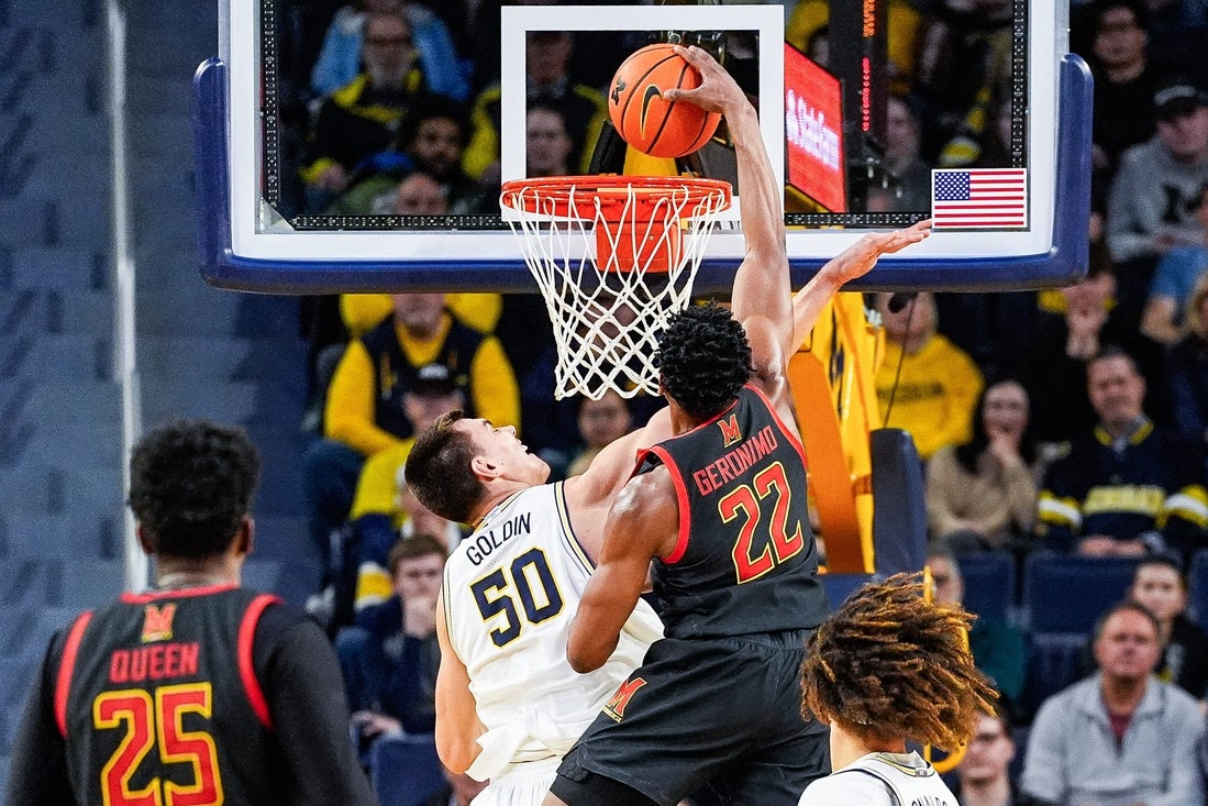 Maryland forward Jordan Geronimo (22) dunks against Michigan center Vladislav Goldin (50) during the first half at Crisler Center in Ann Arbor on Wednesday, March 5, 2025.