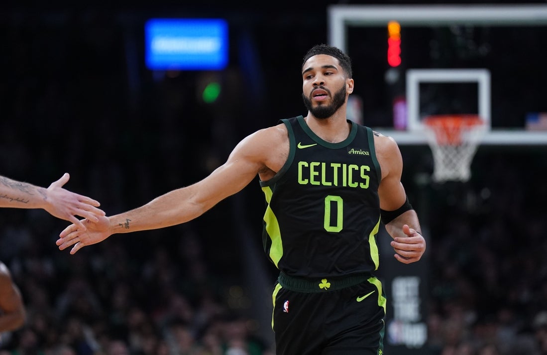 Mar 6, 2025; Boston, Massachusetts, USA; Boston Celtics forward Jayson Tatum (0) reacts after his basket against the Philadelphia 76ers in the first quarter at TD Garden. Mandatory Credit: David Butler II-Imagn Images