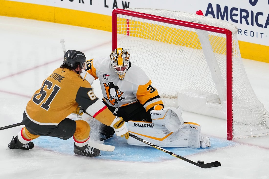 Mar 7, 2025; Las Vegas, Nevada, USA; Vegas Golden Knights right wing Mark Stone (61) scores a goal against Pittsburgh Penguins goaltender Alex Nedeljkovic (39) during the third period at T-Mobile Arena. Mandatory Credit: Stephen R. Sylvanie-Imagn Images