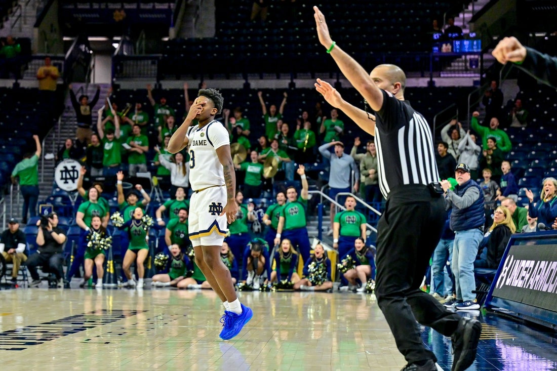 Mar 8, 2025; South Bend, Indiana, USA; Notre Dame Fighting Irish guard Markus Burton (3) reacts after a three point basket in the first overtime against the Cal Bears at the Purcell Pavilion. Mandatory Credit: Matt Cashore-Imagn Images