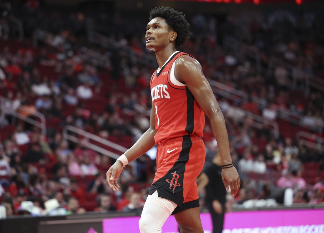 Mar 8, 2025; Houston, Texas, USA; Houston Rockets forward Amen Thompson (1) walks off the court after suffering an apparent injury during the fourth quarter against the New Orleans Pelicans at Toyota Center. Mandatory Credit: Troy Taormina-Imagn Images