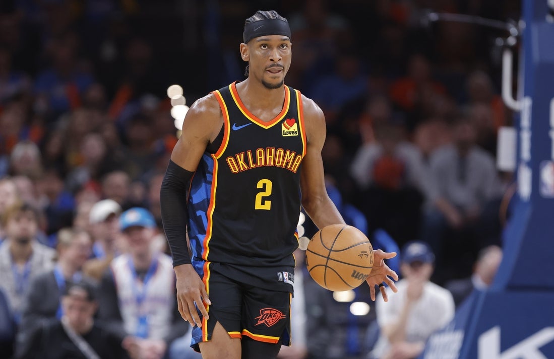 Mar 9, 2025; Oklahoma City, Oklahoma, USA; Oklahoma City Thunder guard Shai Gilgeous-Alexander (2) dribbles down the court against the Denver Nuggets during the second half at Paycom Center. Mandatory Credit: Alonzo Adams-Imagn Images