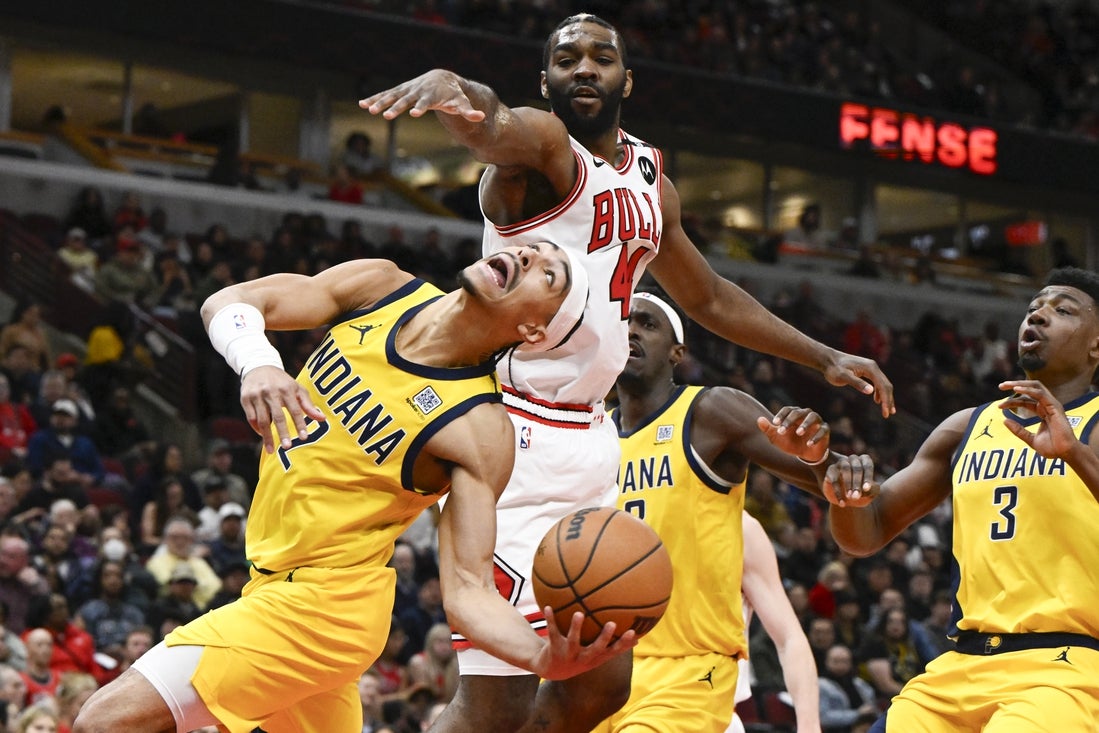 Mar 10, 2025; Chicago, Illinois, USA; Chicago Bulls forward Patrick Williams (44) defends against Indiana Pacers guard Andrew Nembhard (2) during the first half at United Center. Mandatory Credit: Matt Marton-Imagn Images