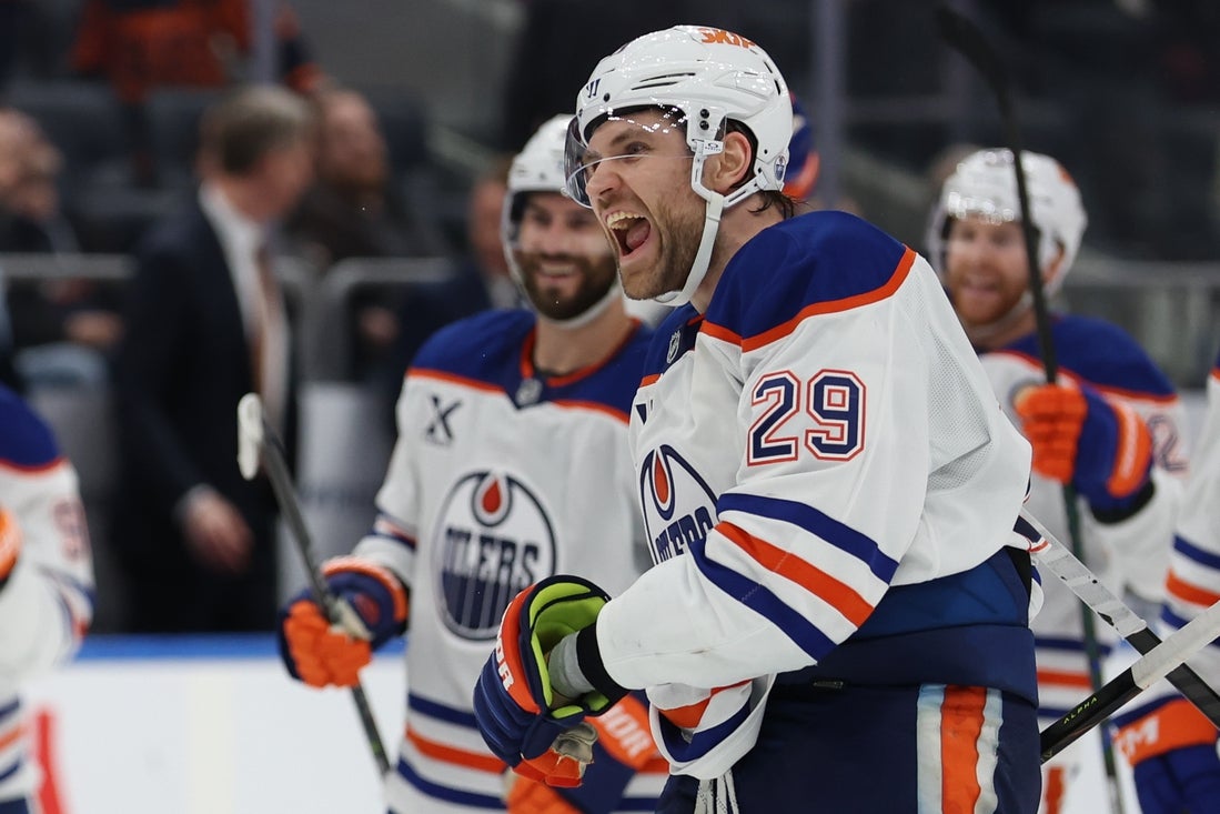 Mar 14, 2025; Elmont, New York, USA; Edmonton Oilers center Leon Draisaitl (29) celebrates the game winning goal after overtime against the New York Islanders at UBS Arena. Mandatory Credit: Thomas Salus-Imagn Images