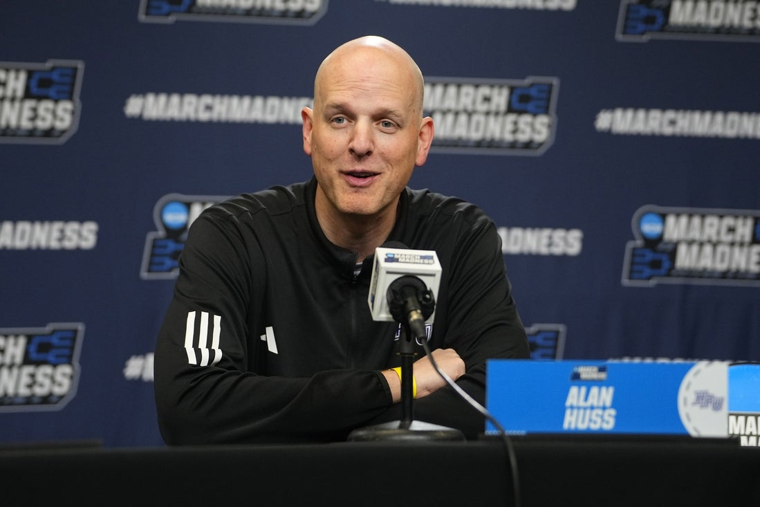 Mar 19, 2025; Providence, RI, USA; High Point Panthers head coach Alan Huss answers questions during the press conference at Amica Mutual Pavilion. Mandatory Credit: Gregory Fisher-Imagn Images