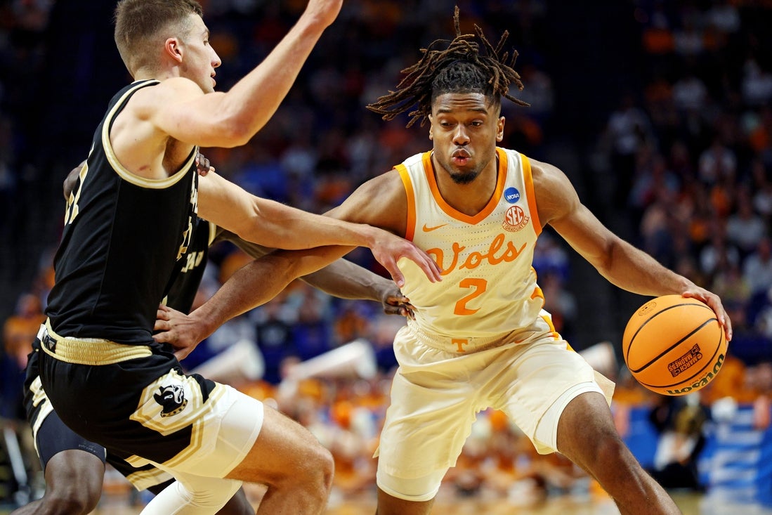 Mar 20, 2025; Lexington, KY, USA; Tennessee Volunteers guard Chaz Lanier (2) drives to the basket against Wofford Terriers forward Jeremy Lorenz (32) during the first half in the first round of the NCAA Tournament at Rupp Arena. Mandatory Credit: Jordan Prather-Imagn Images
