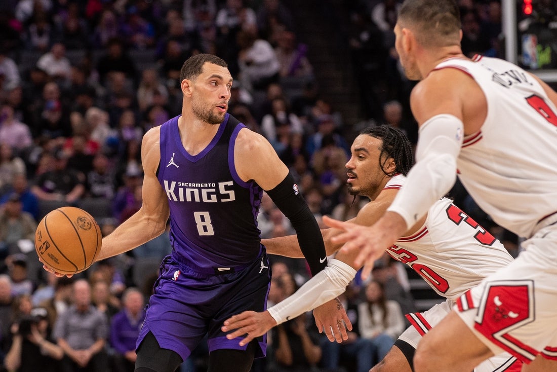 Mar 20, 2025; Sacramento, California, USA; Sacramento Kings guard Zach LaVine (8) controls the ball during the second quarter of the game against the Chicago Bulls at Golden 1 Center. Mandatory Credit: Ed Szczepanski-Imagn Images