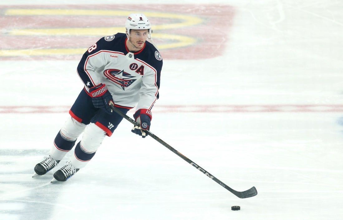 Mar 21, 2025; Pittsburgh, Pennsylvania, USA; Columbus Blue Jackets defenseman Zach Werenski (8) warms up before the game against the Pittsburgh Penguins at PPG Paints Arena. Mandatory Credit: Charles LeClaire-Imagn Images