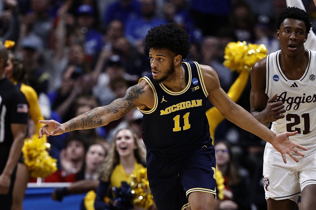 Mar 22, 2025; Denver, CO, USA; Michigan Wolverines guard Roddy Gayle Jr. (11) reacts against the Texas A&M Aggies during the second half in the second round of the NCAA Tournament at Ball Arena. Mandatory Credit: Isaiah J. Downing-Imagn Images