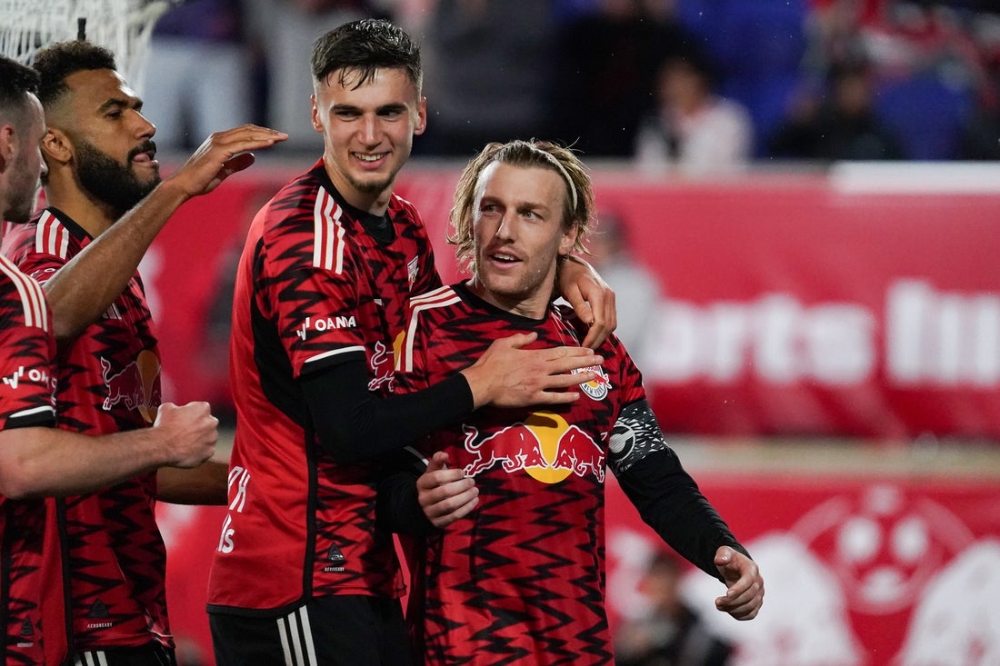Mar 22, 2025; Harrison, New Jersey, USA; New York Red Bulls midfielder Emil Forsberg (10) celebrates with teammates after scoring on a penalty kick during the first half against Toronto FC at Sports Illustrated Stadium. Mandatory Credit: Lucas Boland-Imagn Images