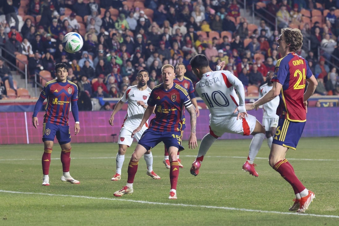 Mar 22, 2025; Sandy, Utah, USA; FC Dallas midfielder Luciano Acosta (10) heads a ball for a goal against Real Salt Lake during the first half at America First Field. Mandatory Credit: Rob Gray-Imagn Images