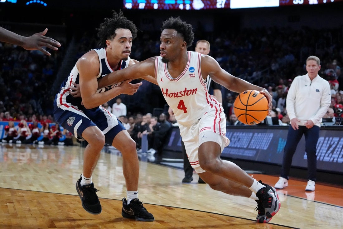 Mar 22, 2025; Wichita, KS, USA; Houston Cougars guard L.J. Cryer (4) drives to the basket against Gonzaga Bulldogs guard Ryan Nembhard (0) during the first half at Intrust Bank Arena. Mandatory Credit: Kirby Lee-Imagn Images
