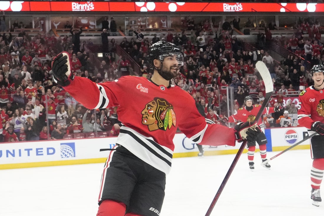 Mar 23, 2025; Chicago, Illinois, USA; Chicago Blackhawks center Joe Veleno (90) celebrates after his goal against the Philadelphia Flyers during the first period at United Center. Mandatory Credit: David Banks-Imagn Images