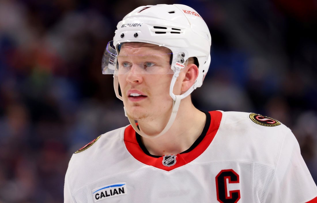 Mar 25, 2025; Buffalo, New York, USA; Ottawa Senators left wing Brady Tkachuk (7) during a stoppage in play against the Buffalo Sabres at KeyBank Center. Mandatory Credit: Timothy T. Ludwig-Imagn Images