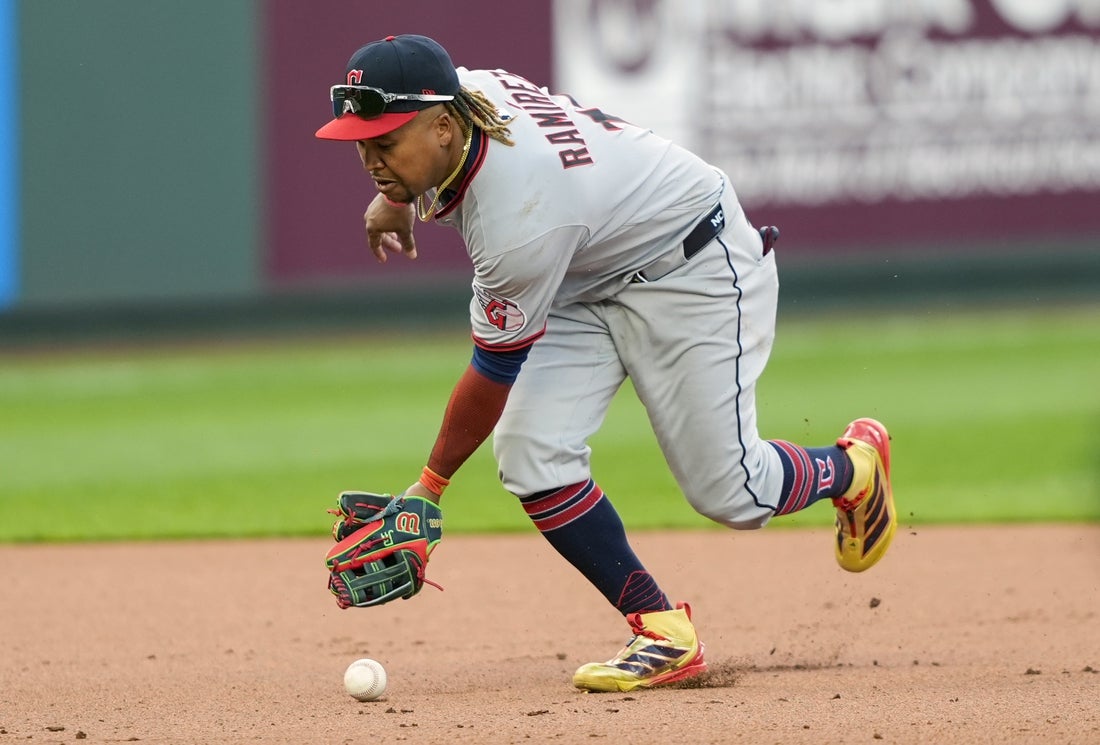 Cleveland Guardians third baseman Jose Ramirez (11) is unable to field a ground ball during the ninth inning against the Kansas City Royals at Kauffman Stadium. Mandatory Credit: Jay Biggerstaff-Imagn Images