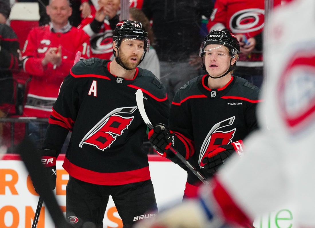 Mar 28, 2025; Raleigh, North Carolina, USA; Carolina Hurricanes right wing Jackson Blake (53) celebrates his goal with defenseman Jaccob Slavin (74) against the Montreal Canadiens during the first period at Lenovo Center. Mandatory Credit: James Guillory-Imagn Images