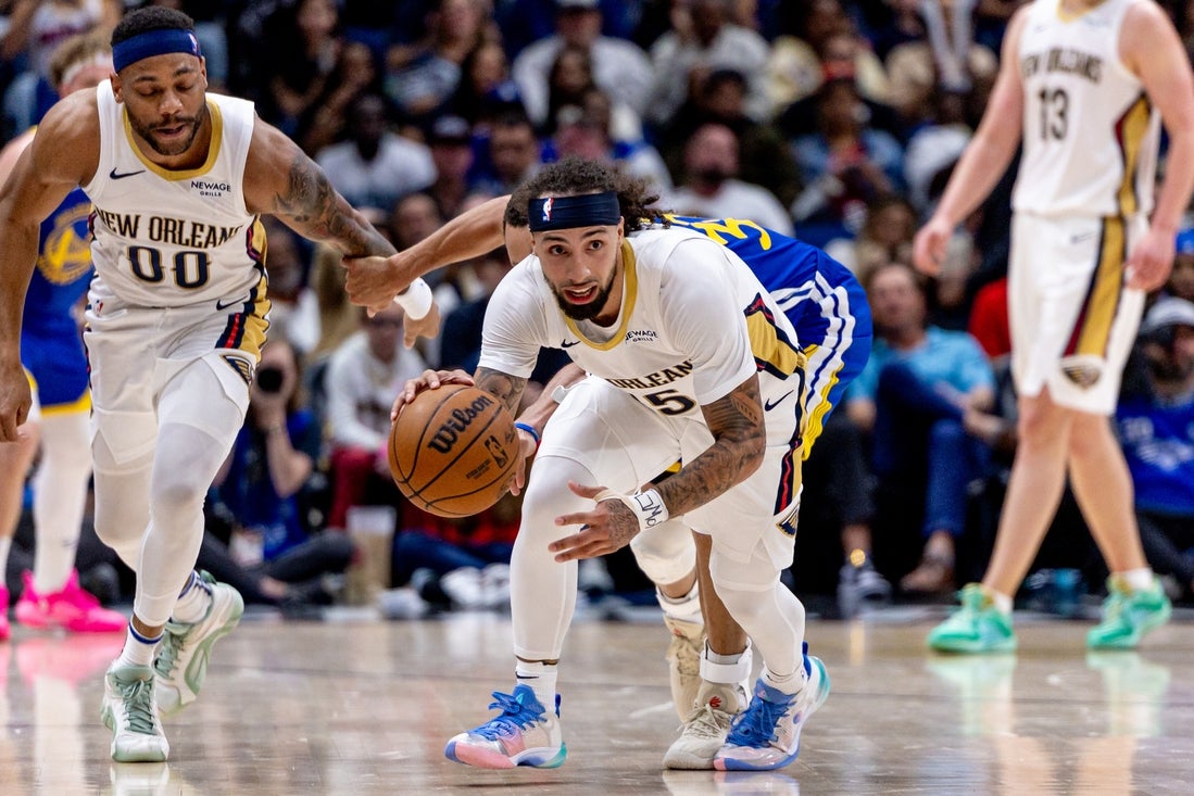 Mar 28, 2025; New Orleans, Louisiana, USA; New Orleans Pelicans guard Jose Alvarado (15) steals the ball from Golden State Warriors guard Stephen Curry (30) during the first half at Smoothie King Center. Mandatory Credit: Stephen Lew-Imagn Images