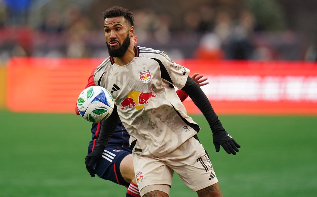 Mar 29, 2025; Foxborough, Massachusetts, USA; New York Red Bulls forward Eric Maxim Choupo-Moting (13) moves the ball against the New England Revolution in the first half at Gillette Stadium. Mandatory Credit: David Butler II-Imagn Images