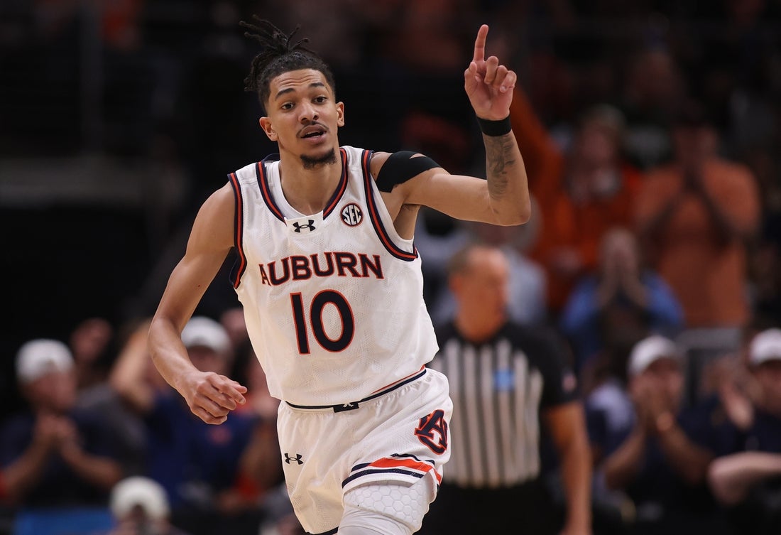 Mar 30, 2025; Atlanta, GA, USA; Auburn Tigers guard Chad Baker-Mazara (10) reacts after a play during the second half in the South Regional final of the 2025 NCAA tournament against the Michigan State Spartans at State Farm Arena. Mandatory Credit: Brett Davis-Imagn Images