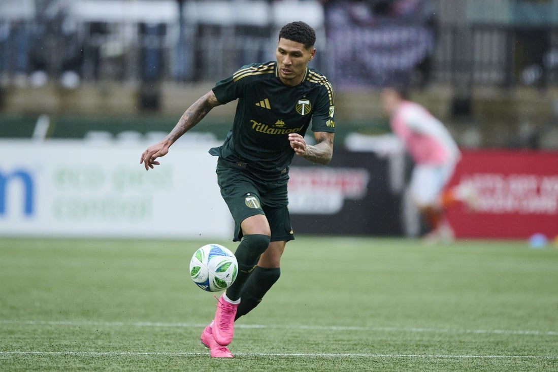 Mar 30, 2025; Portland, Oregon, USA; Portland Timbers forward Antony (11) controls a pass during the second half against the Houston Dynamo at Providence Park. Mandatory Credit: Troy Wayrynen-Imagn Images