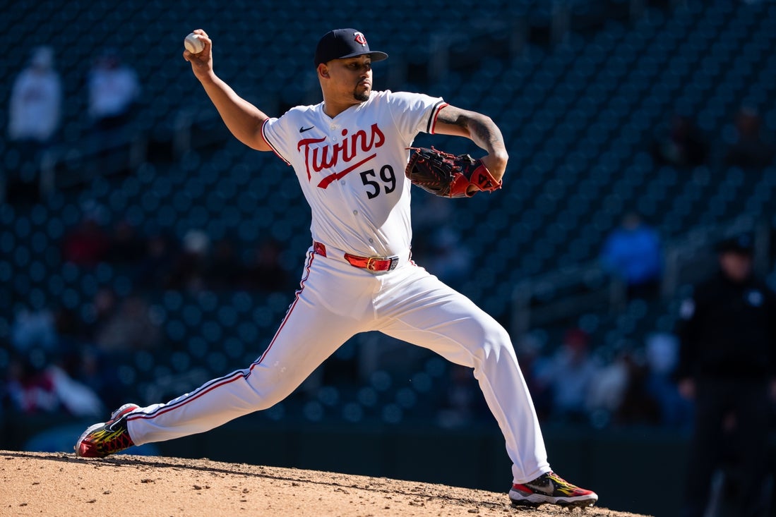 Apr 5, 2025; Minneapolis, Minnesota, USA; Minnesota Twins relief pitcher Jhoan Duran (59) delivers a pitch during the ninth inning against the Houston Astros¡ at Target Field. Mandatory Credit: Jordan Johnson-Imagn Images