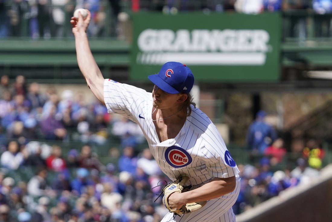Apr 6, 2025; Chicago, Illinois, USA; Chicago Cubs pitcher Ben Brown (32) throws the ball against the San Diego Padres during the first inning at Wrigley Field. Mandatory Credit: David Banks-Imagn Images