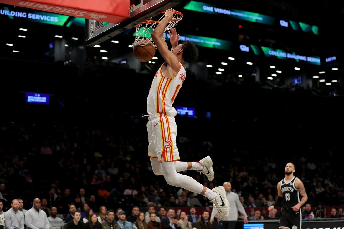 Apr 10, 2025; Brooklyn, New York, USA; Atlanta Hawks forward Zaccharie Risacher (10) dunks against the Brooklyn Nets during the third quarter at Barclays Center. Mandatory Credit: Brad Penner-Imagn Images