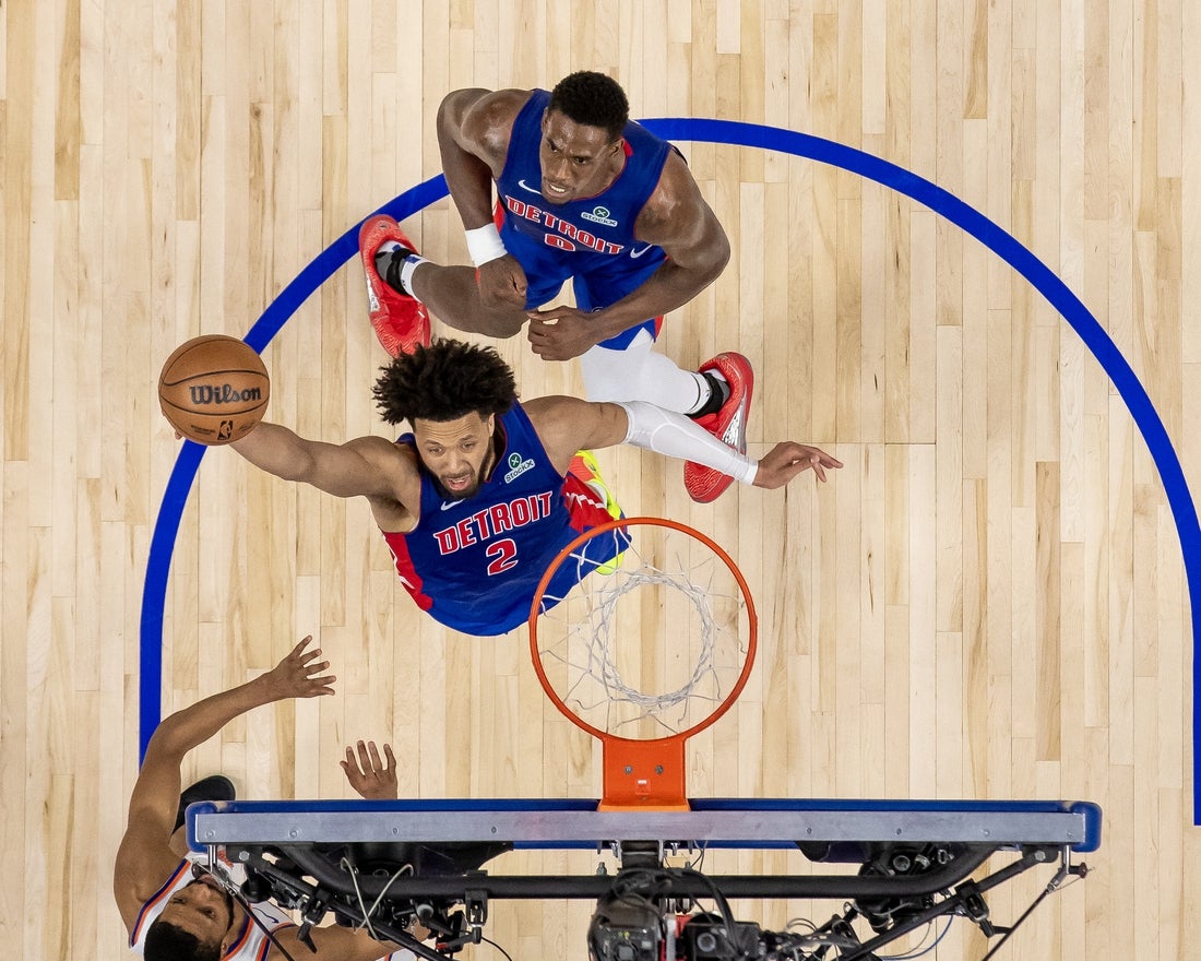 Apr 10, 2025; Detroit, Michigan, USA; Detroit Pistons guard Cade Cunningham (2) drives to the basket for two points against the New York Knicks during the second half at Little Caesars Arena. Mandatory Credit: David Reginek-Imagn Images