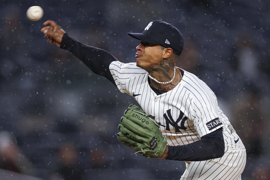Apr 11, 2025; Bronx, New York, USA; New York Yankees starting pitcher Marcus Stroman (0) delivers a pitch during the first inning against the San Francisco Giants at Yankee Stadium. Mandatory Credit: Vincent Carchietta-Imagn Images