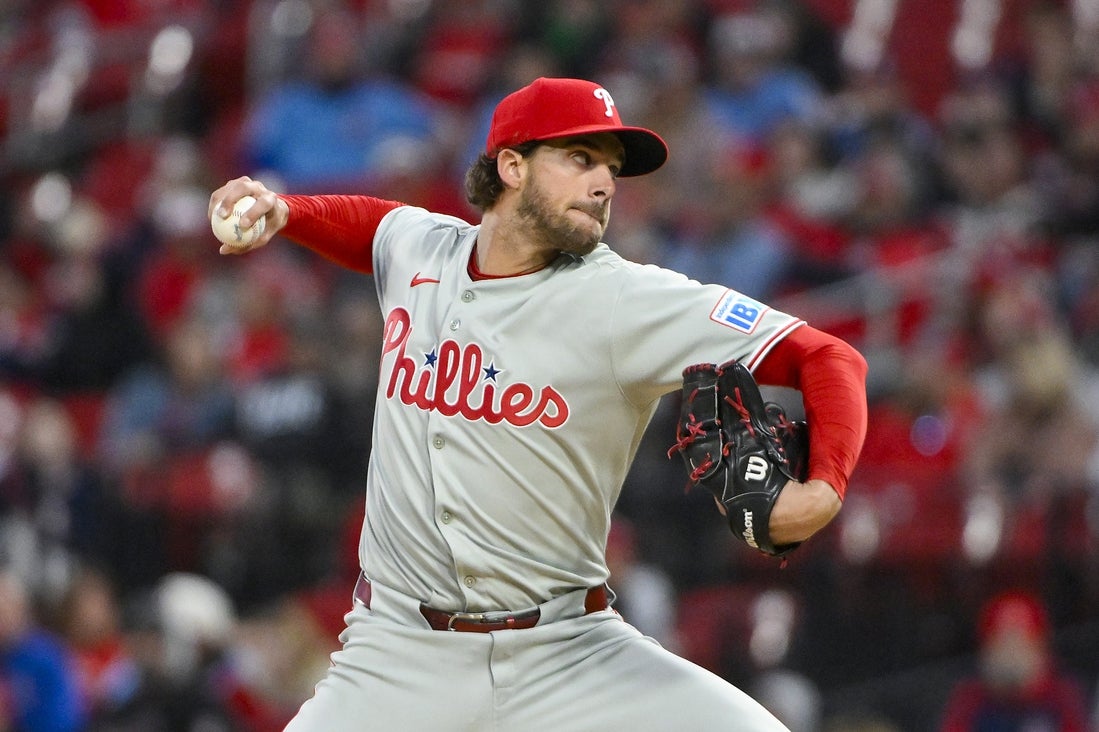 Apr 11, 2025; St. Louis, Missouri, USA; Philadelphia Phillies starting pitcher Aaron Nola (27) pitches against the St. Louis Cardinals during the first inning at Busch Stadium. Mandatory Credit: Jeff Curry-Imagn Images