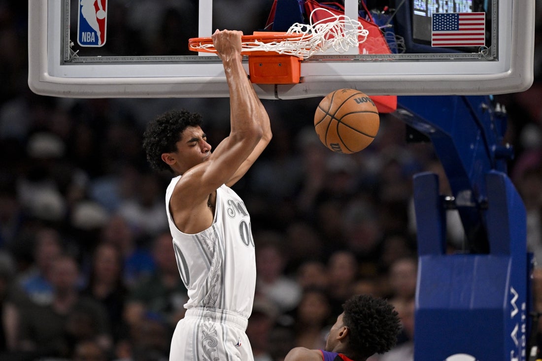 Apr 11, 2025; Dallas, Texas, USA; Dallas Mavericks guard Max Christie (00) dunks the ball against the Toronto Raptors during the second quarter at the American Airlines Center. Mandatory Credit: Jerome Miron-Imagn Images