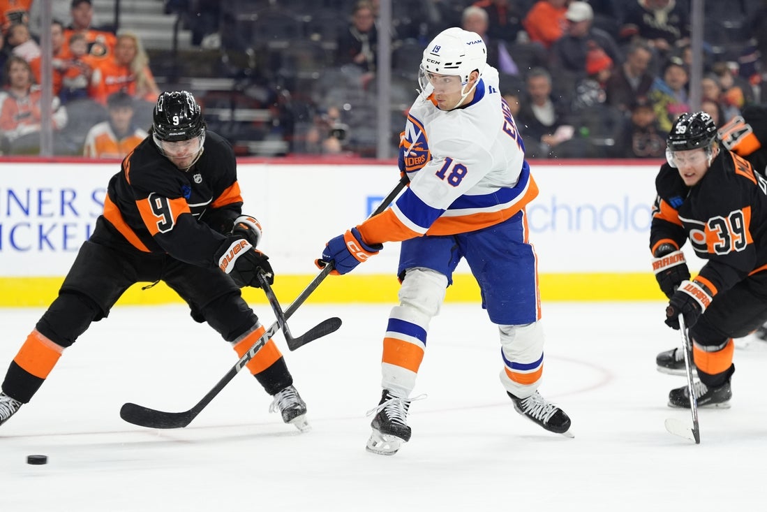 Apr 12, 2025; Philadelphia, Pennsylvania, USA; New York Islanders left wing Pierre Engvall (18) shoots the puck against the Philadelphia Flyers in the first period at Wells Fargo Center. Mandatory Credit: Kyle Ross-Imagn Images