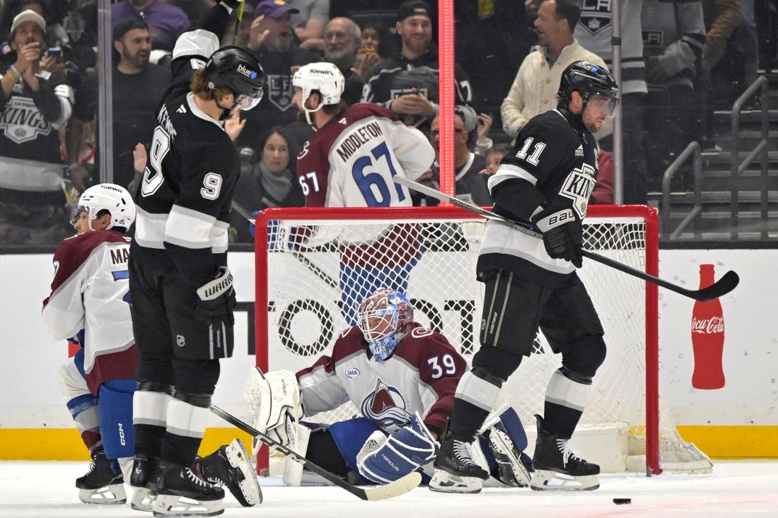 Apr 12, 2025; Los Angeles, California, USA; Los Angeles Kings right wing Adrian Kempe (9) and center Anze Kopitar (11) celebrate after a goal past Colorado Avalanche goaltender Mackenzie Blackwood (39) during the first period at Crypto.com Arena. Mandatory Credit: Jayne Kamin-Oncea-Imagn Images
