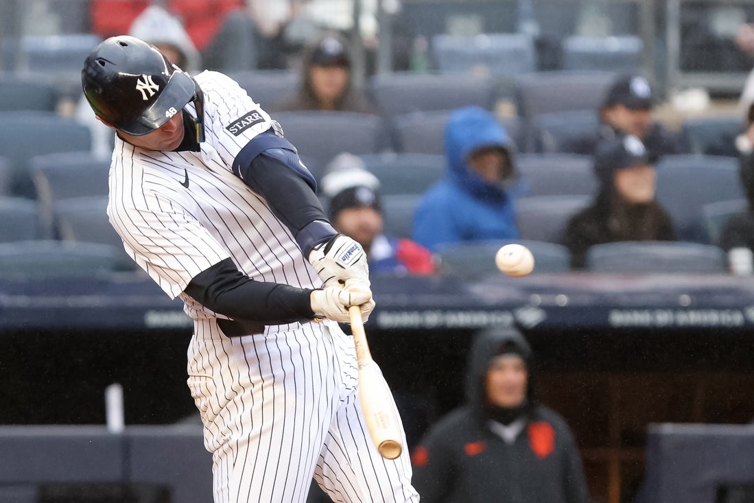 Apr 12, 2025; Bronx, New York, USA; New York Yankees first base Paul Goldschmidt (48) hits a double against the San Francisco Giants during the fifth inning at Yankee Stadium. Mandatory Credit: Tom Horak-Imagn Images