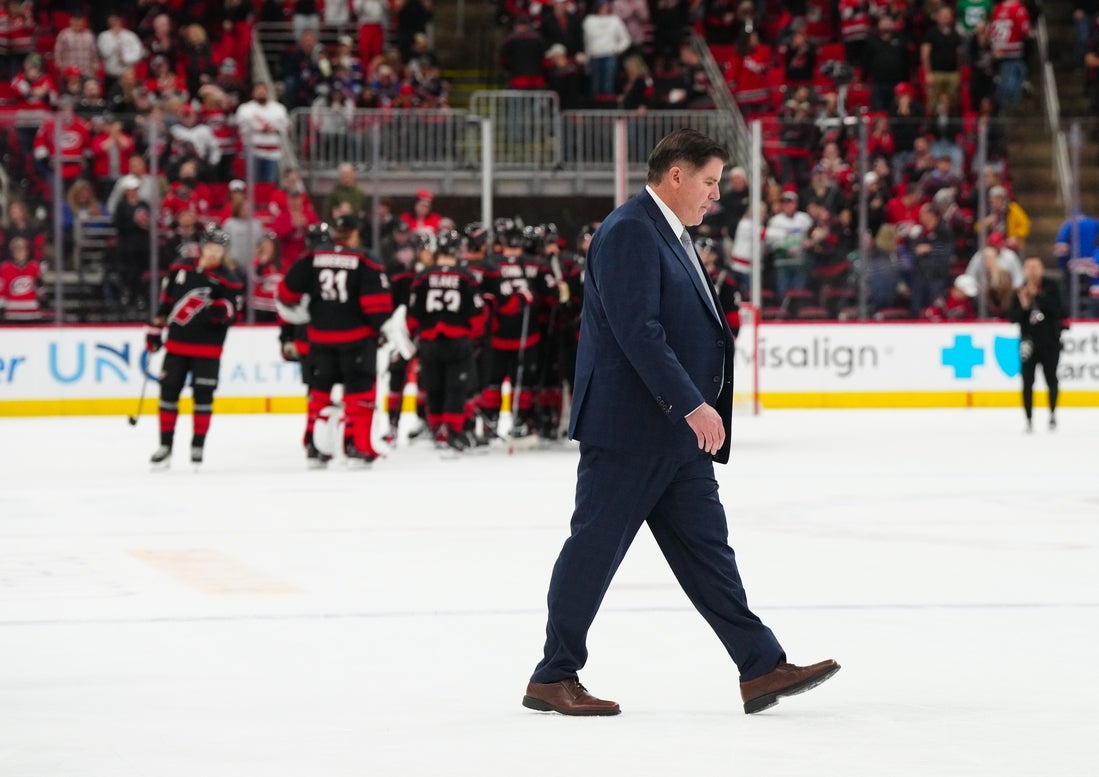 Apr 12, 2025; Raleigh, North Carolina, USA; New York Rangers head coach Peter Laviolette walks off the ice after their loss to the Carolina Hurricanes at Lenovo Center. Mandatory Credit: James Guillory-Imagn Images