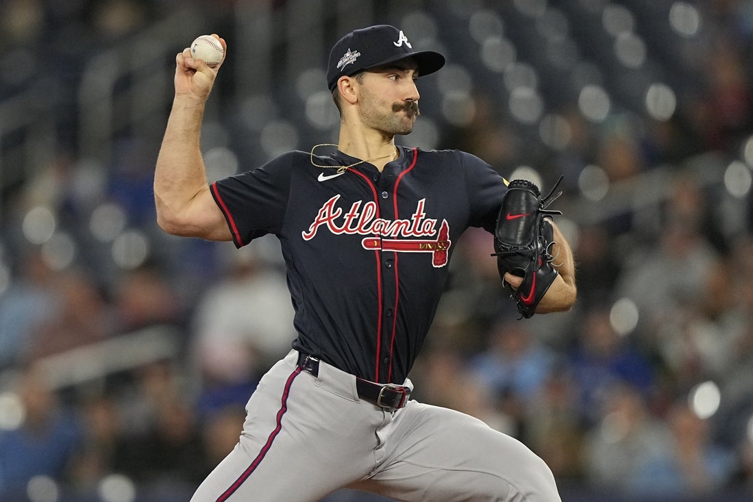 Apr 16, 2025; Toronto, Ontario, CAN; Atlanta Braves starting pitcher Spencer Strider (99) pitches to the Toronto Blue Jays during the first inning at Rogers Centre. Mandatory Credit: John E. Sokolowski-Imagn Images