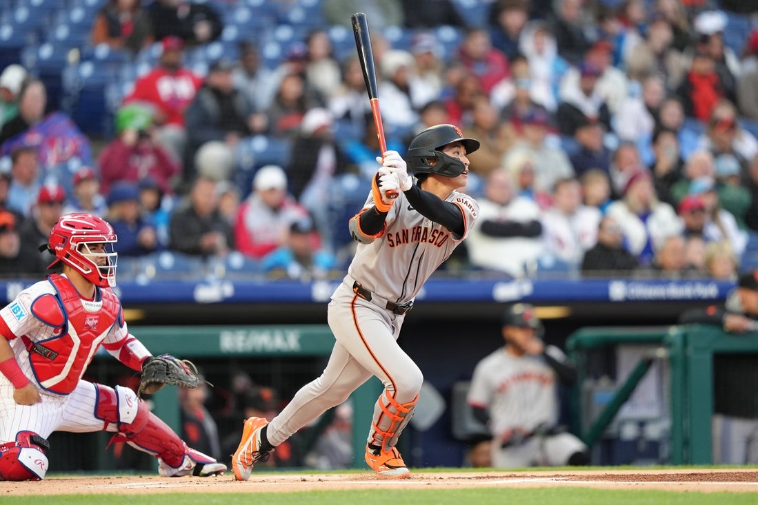 Apr 16, 2025; Philadelphia, Pennsylvania, USA; San Francisco Giants outfielder Jung Hoo Lee (51) hits an RBI single against the Philadelphia Phillies in the first inning at Citizens Bank Park. Mandatory Credit: Kyle Ross-Imagn Images