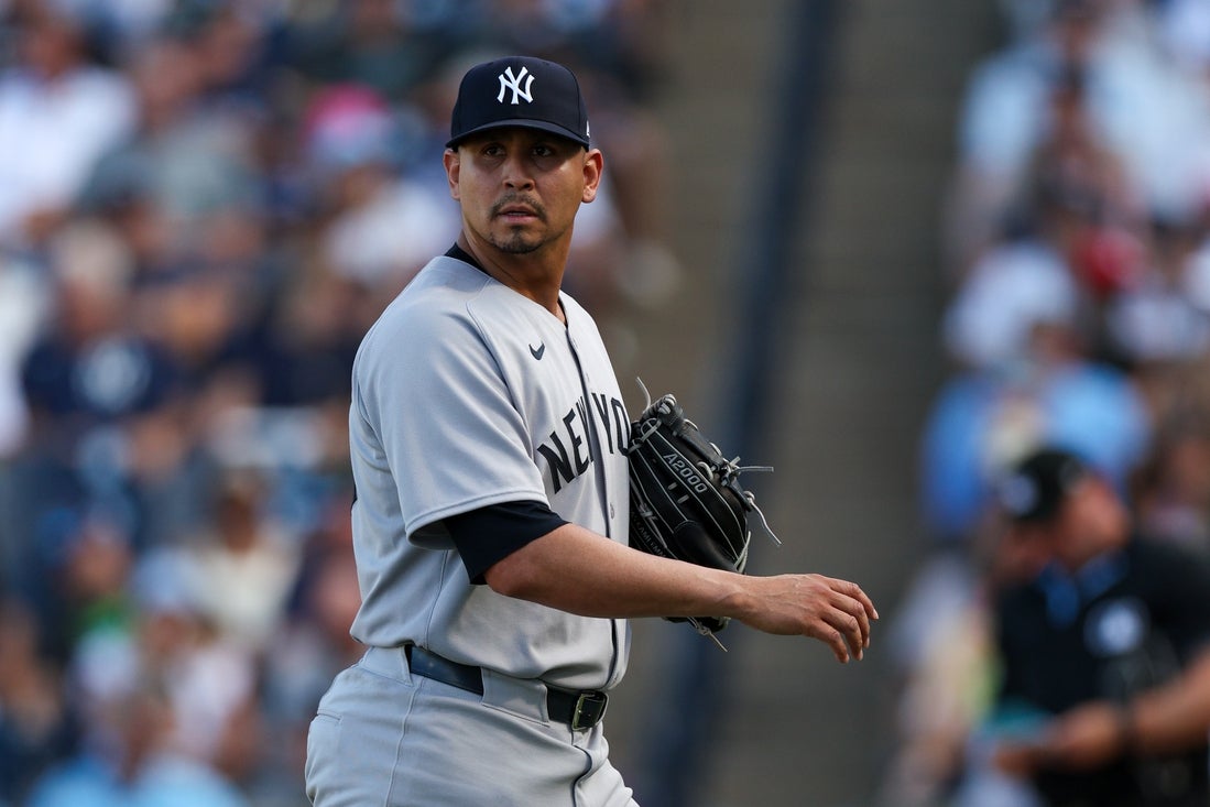 Apr 19, 2025; Tampa, Florida, USA; New York Yankees pitcher Carlos Carrasco (59) leaves the game against the Tampa Bay Rays in the fifth inning at George M. Steinbrenner Field. Mandatory Credit: Nathan Ray Seebeck-Imagn Images