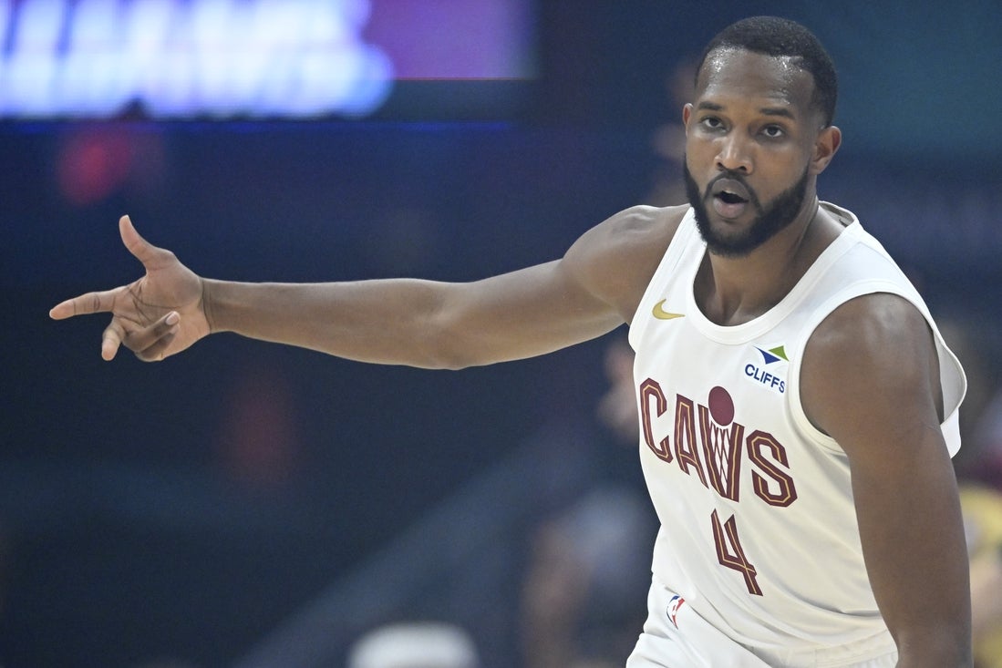 Apr 20, 2025; Cleveland, Ohio, USA; Cleveland Cavaliers forward Evan Mobley (4) celebrates his three-point basket in the first quarter against the Miami Heat at Rocket Arena. Mandatory Credit: David Richard-Imagn Images