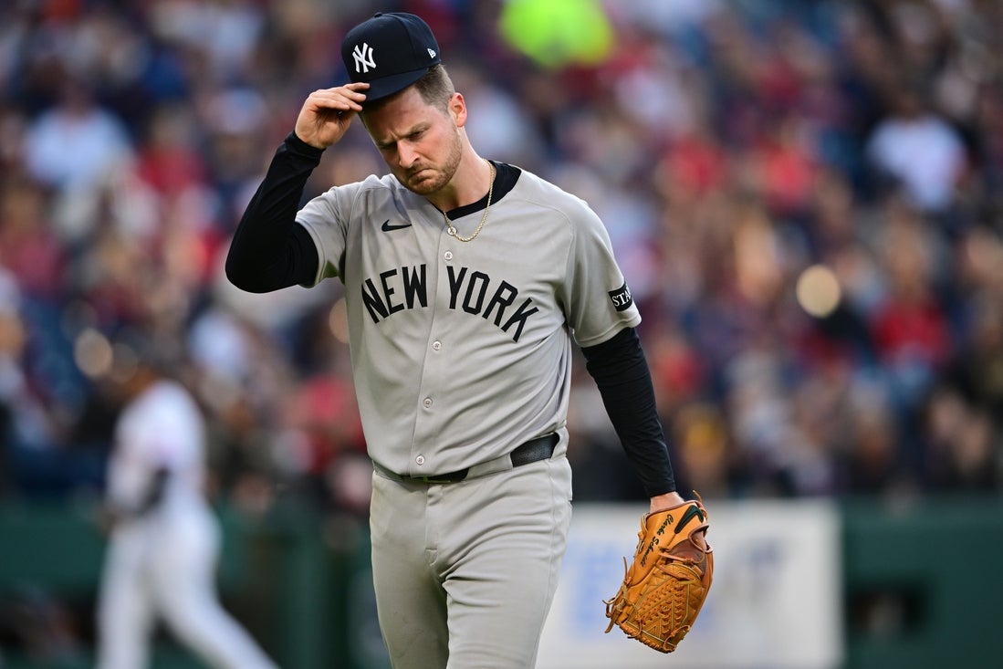 Apr 21, 2025; Cleveland, Ohio, USA; New York Yankees starting pitcher Clarke Schmidt (36) walks to the dugout after the third inning against the Cleveland Guardians at Progressive Field. Mandatory Credit: David Dermer-Imagn Images