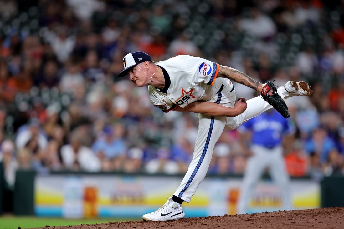 Apr 21, 2025; Houston, Texas, USA; Houston Astros starting pitcher Hunter Brown (58) delivers a pitch against the Toronto Blue Jays during the seventh inning at Daikin Park. Mandatory Credit: Erik Williams-Imagn Images