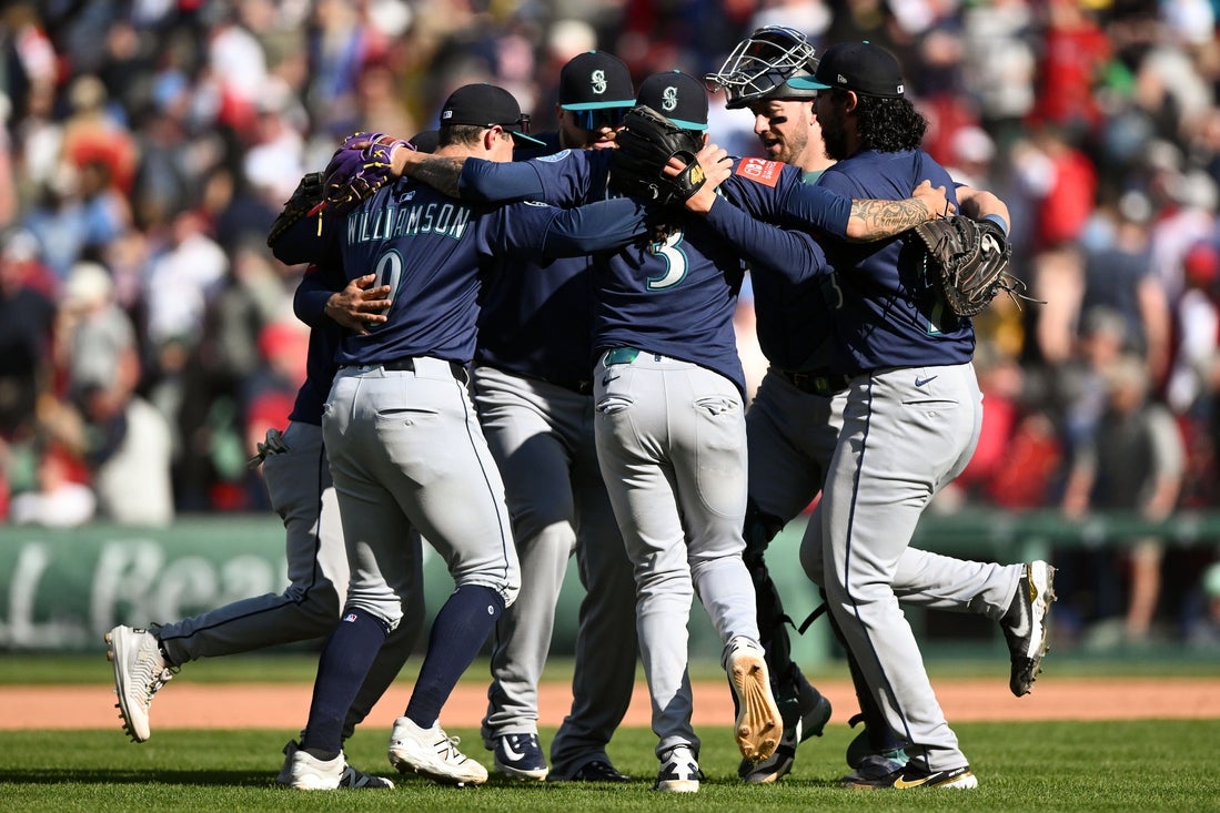 Apr 24, 2025; Boston, Massachusetts, USA; The Seattle Mariners celebrate after a game against the Boston Red Sox at Fenway Park. Mandatory Credit: Brian Fluharty-Imagn Images