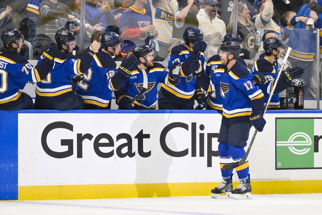 Apr 24, 2025; St. Louis, Missouri, USA; St. Louis Blues defenseman Cam Fowler (17) is congratulated by teammates after scoring against the Winnipeg Jets during the first period in game three of the first round of the 2025 Stanley Cup Playoffs at Enterprise Center. Mandatory Credit: Jeff Curry-Imagn Images
