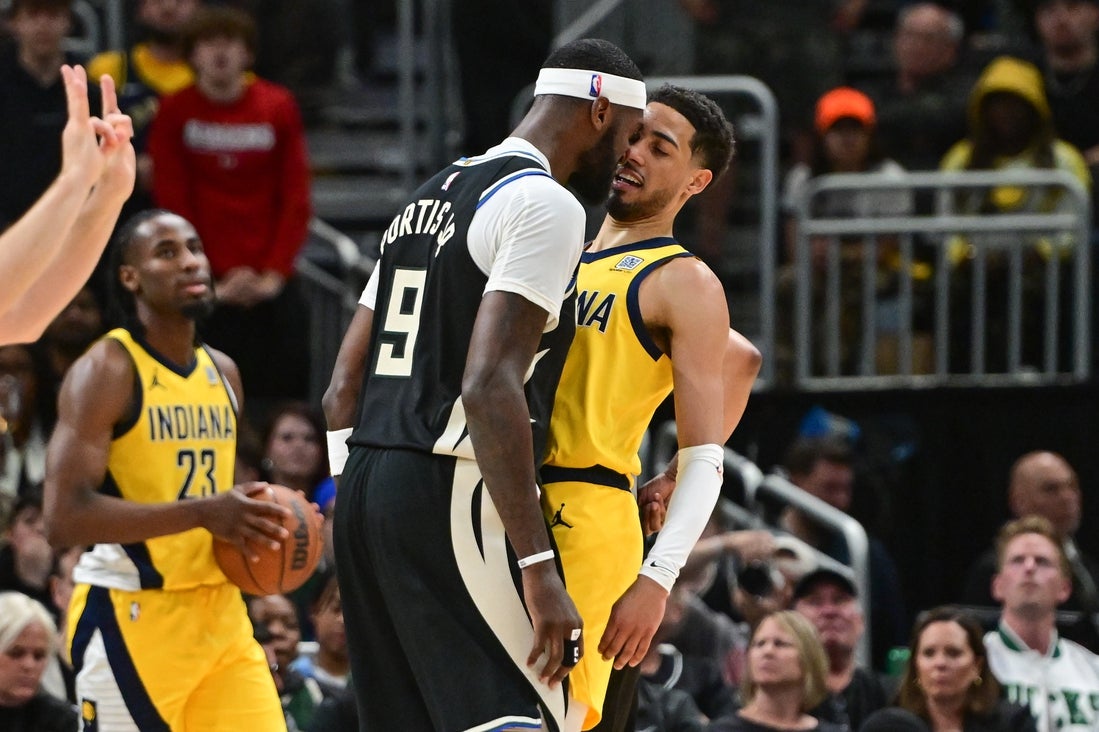 Apr 27, 2025; Milwaukee, Wisconsin, USA; Milwaukee Bucks forward Bobby Portis (9) head butt Indiana Pacers guard Tyrese Haliburton (0) in the second quarter during game four of first round for the 2024 NBA Playoffs at Fiserv Forum. Mandatory Credit: Benny Sieu-Imagn Images