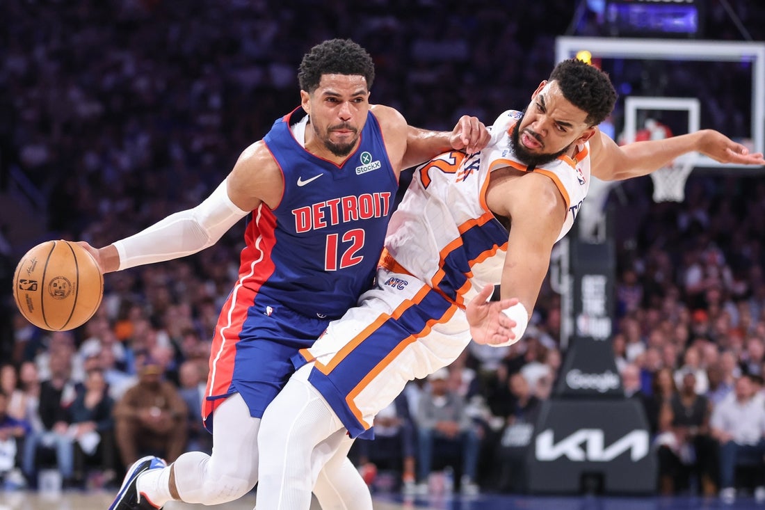 Apr 29, 2025; New York, New York, USA; Detroit Pistons forward Tobias Harris (12) collides with New York Knicks center Karl-Anthony Towns (32) in the second quarter during game five of first round for the 2025 NBA Playoffs at Madison Square Garden. Mandatory Credit: Wendell Cruz-Imagn Images