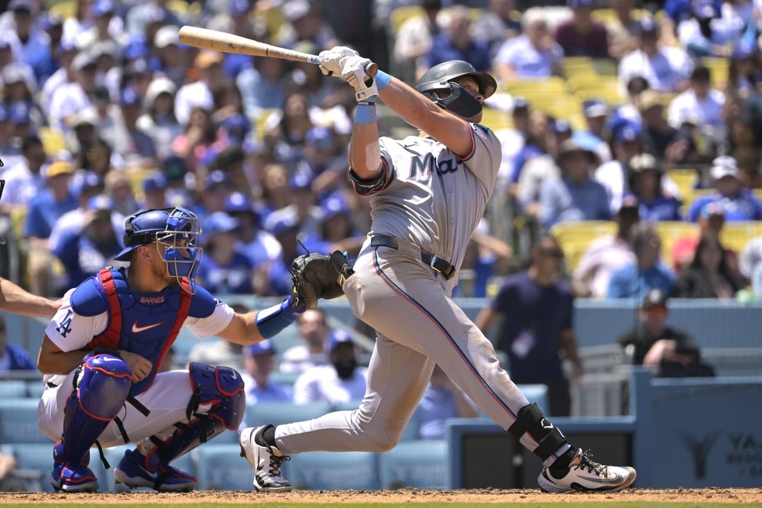 Apr 30, 2025; Los Angeles, California, USA; Miami Marlins right fielder Kyle Stowers (28) doubles in a run in the sixth inning against the Los Angeles Dodgers at Dodger Stadium. Mandatory Credit: Jayne Kamin-Oncea-Imagn Images