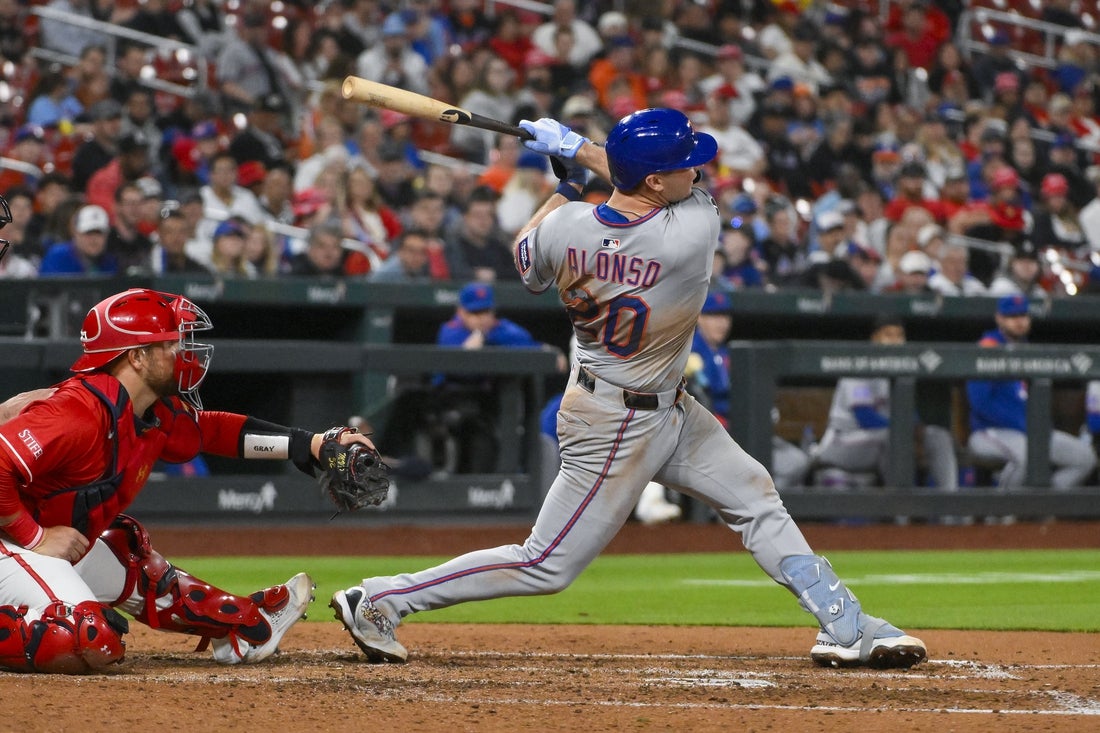 May 2, 2025; St. Louis, Missouri, USA; New York Mets first baseman Pete Alonso (20) hits a two run home run against the St. Louis Cardinals during the fifth inning at Busch Stadium. Mandatory Credit: Jeff Curry-Imagn Images